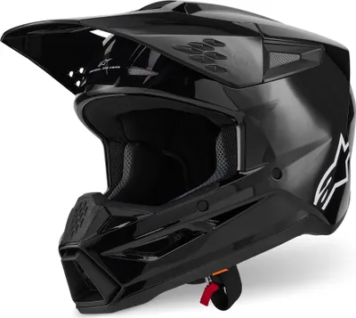 A black motocross helmet is shown against a white background.