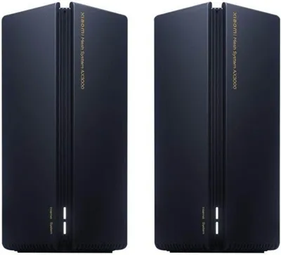 Two black Xiaomi Mesh System AX3000 routers are shown side-by-side against a white background.