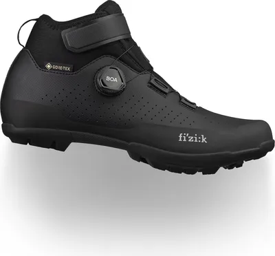 A black winter cycling shoe with a Gore-Tex logo and a BOA closure system.
