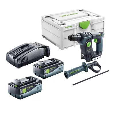 A collection of power tools and accessories, including a hammer drill, batteries, a charger, and a storage case, arranged on a white background.