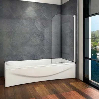A modern bathroom with a bathtub, a glass shower screen, and a large window overlooking a body of water.