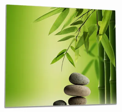 Produktbild von Wallario Herdabdeckplatte aus Glas, Größe 60 x 52 cm 1-teilig, Motiv Steinstapel im Grünen