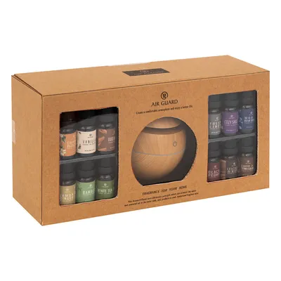A product box containing an essential oil diffuser and multiple bottles of essential oils.