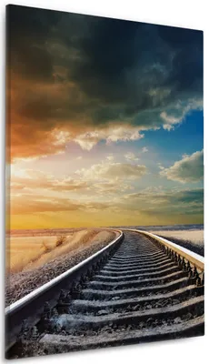 Produktbild von Wallario Premium Leinwandbild Bahnschienen ins Ungewisse in Größe 60 x 90 cm