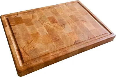 Imagen del producto de Tabla de cortar de roble INNOVAHOME Stirnholz, 40x28x3 cm, con ranura para recoger los jugos