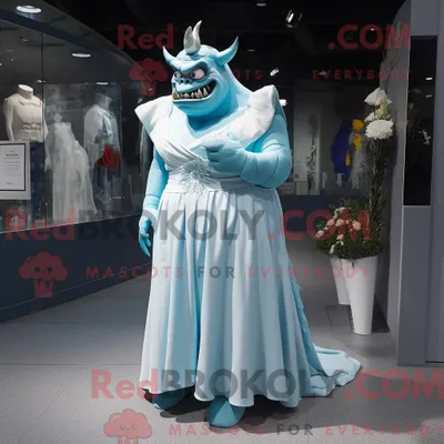 Produktbild von Maskottchen REDBROKOLY eines cyanfarbenen Ogers mit Brautkleid und Schnürsenkeln