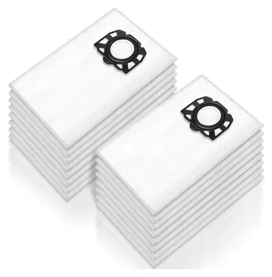 Two stacks of white vacuum cleaner bags with black plastic connectors.