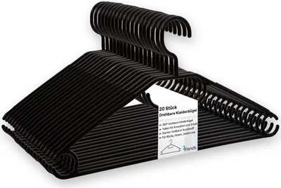 A stack of black plastic clothes hangers.
