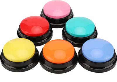 A group of six colorful communication buttons for pets arranged in a semi-circle on a white background.