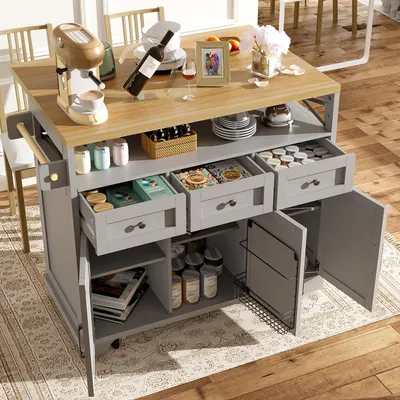 Zdjęcie produktu dla Wyspa kuchenna w kolorze szarym, o wymiarach 118 x 43–80 x 98 cm, wykonana z MDF i metalu. Mobilny wózek kuchenny z miejscem do przechowywania, trzema szufladami i rozkładanym blatem
