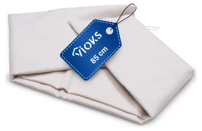 A folded white fabric with a blue tag attached.