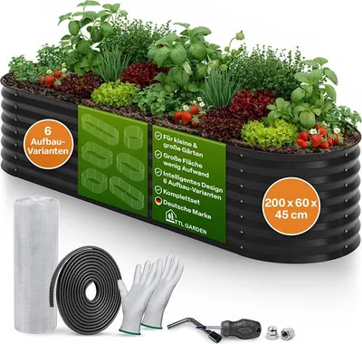 A raised garden bed filled with various plants, including lettuce, strawberries, and herbs, is shown. Several accessories are laid out in front of the bed.