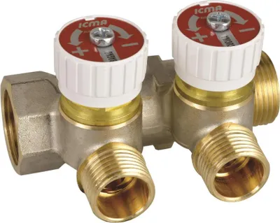 A brass manifold with two adjustable valves, likely for plumbing or heating systems.