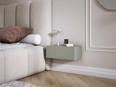 A bedroom scene with a bed, pillows, and a floating nightstand.