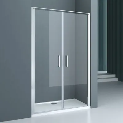A modern shower enclosure with clear glass doors and silver frames, set against a minimalist gray wall and floor.