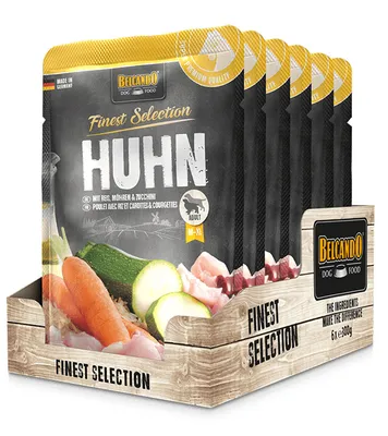 A display box of dog food pouches, with ingredients shown in the foreground.