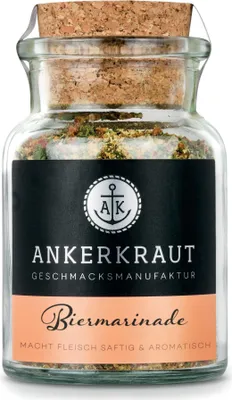 A glass jar of Biermarinade spice mix with a cork stopper.