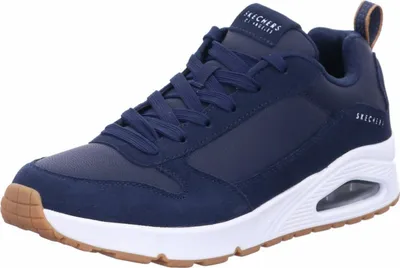 A single navy blue Skechers sneaker is shown against a white background.