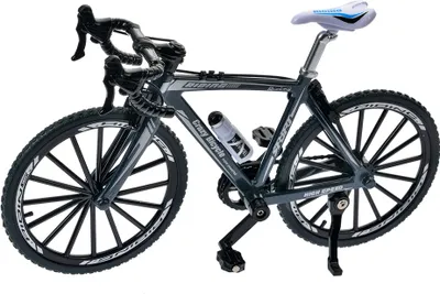A miniature model of a bicycle is displayed against a white background.
