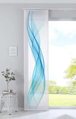 A panel curtain with a blue wave pattern is shown hanging in front of a window.