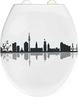 A toilet seat with a black silhouette of a city skyline and its reflection on a white background.