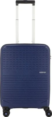 A blue American Tourister suitcase with a retractable handle and wheels, shown from the front against a white background.
