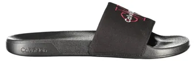 Produktbild von Nachhaltige Herrenschuhe: Schwarze Pantoletten mit Stickerei