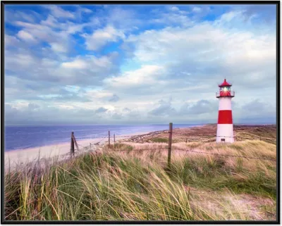Produktbild von Wallario Wandbild Leuchtturm am Strand von Sylt, Größe: 40,30 x 50,30 cm, Poster mit schwarzem Aluminiumrahmen
