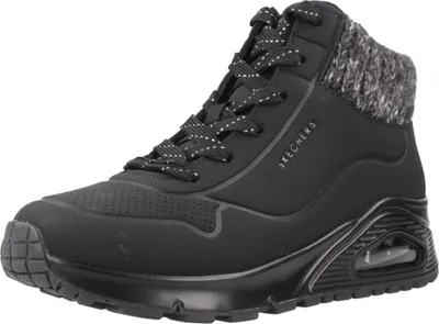 A black Skechers boot with a gray knitted collar and white laces, shown against a white background.