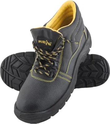 A pair of black work boots with yellow stitching and laces, shown against a white background.