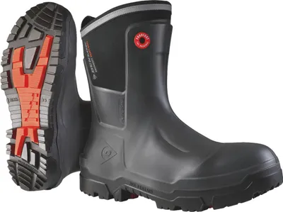 A pair of black Dunlop safety boots, one shown from the side and the other from the sole.