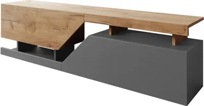 A modern TV stand with a wood top and gray base.