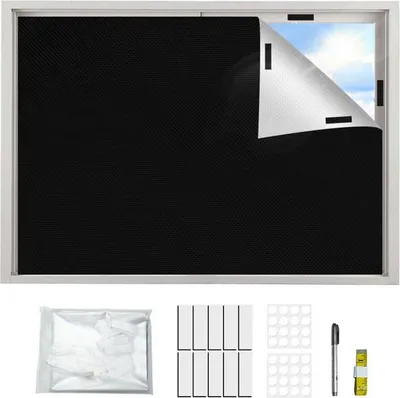 A black blackout roller blind is shown installed on a window, with a corner peeled back to reveal the sky. Below the window, the accessories for installation are laid out: a bag of what appears to be the blind material, velcro strips, circular adhesive pad
