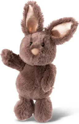 A plush toy rabbit standing against a white background.