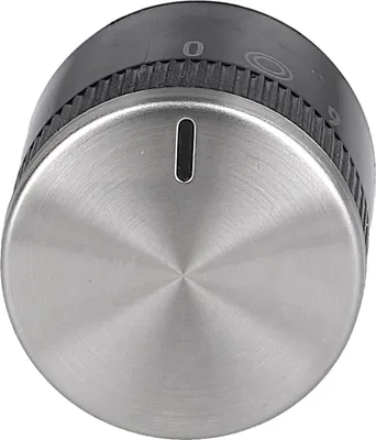 A close-up studio shot of a single, metal and black appliance knob.