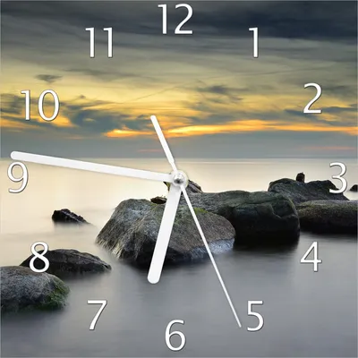 Produktbild von Wallario Design Wanduhr Mystische Felsen im Meer aus Echtglas, Größe 20 x 20 cm