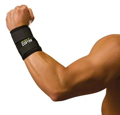 A person's arm wearing a wrist brace.