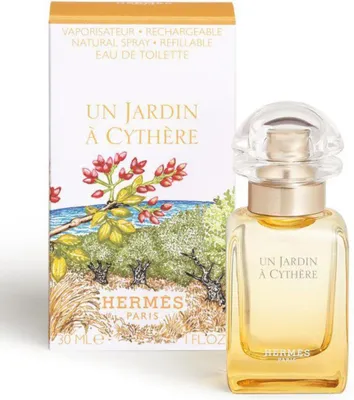 A perfume bottle and its packaging are displayed side-by-side against a white background.
