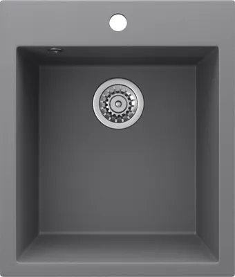 A top-down view of a gray sink with a drain.