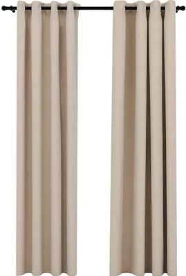 Two beige curtains hanging from a black curtain rod against a white background.