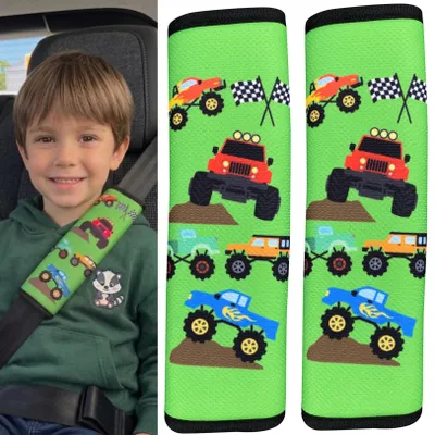 Immagine prodotto di 2x Cuscinetti per cinture di sicurezza HECKBO per bambini con motivo monster truck - Cuscinetti per cinture di sicurezza per bambini e neonati - ideali per qualsiasi cintura di sicurezza per auto, seggiolino per bambini, bicicletta, rimorchio, aeroplano, ragazzi