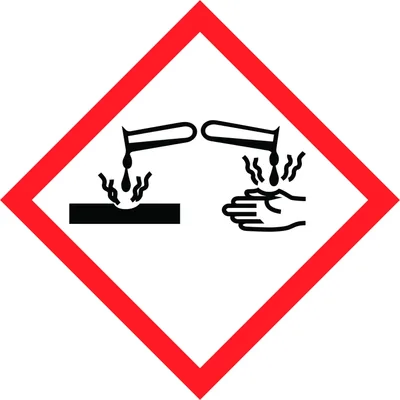 A safety symbol indicating corrosive substances.