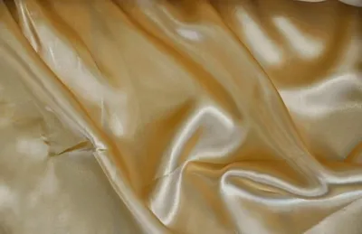 Image de Tissu satin lisse or 150cm