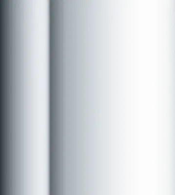 A close-up abstract view of a metallic surface with a gradient of light and shadow.