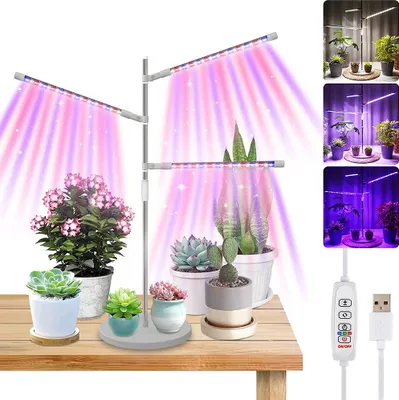 A plant grow light with multiple adjustable arms illuminating several potted plants on a wooden table. The image also includes inset photos showing different lighting modes.