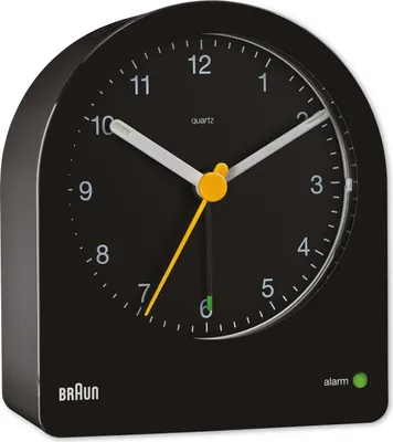 A black alarm clock with white numbers and hands.