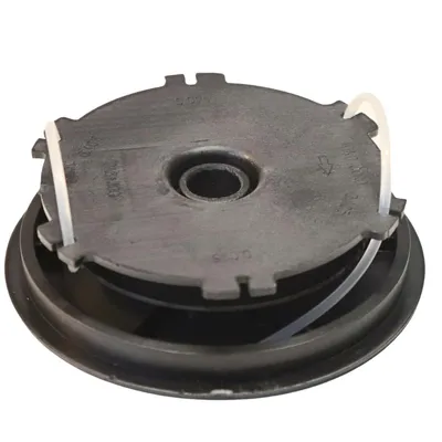A black string trimmer spool with white zip ties holding the string in place, set against a white background.
