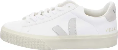 A side view of a white Veja sneaker with light gray accents.