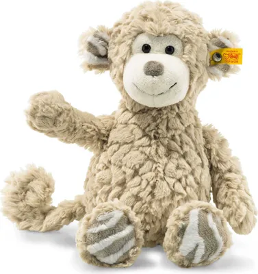 A plush toy monkey sitting on a white background.
