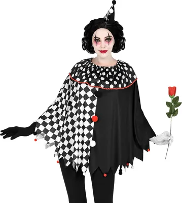 A person dressed as a clown holding a red rose.